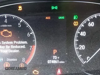2020 Honda Accord Touring with VIN 1HGCV2F96LA018714, listed as a IAAI auction lot 42084295 with 74,861 mi miles and . Bid and sale history available at DreamBid. Image 16.