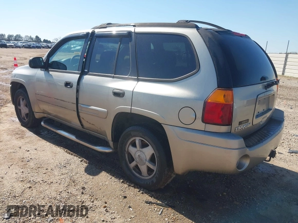 2003 GMC Envoy SLE with VIN 1GKDS13S532176330, listed as a IAAI auction lot 41757554 with 274,878 mi miles. Bid and sale history available at carsss.com. Image 3.