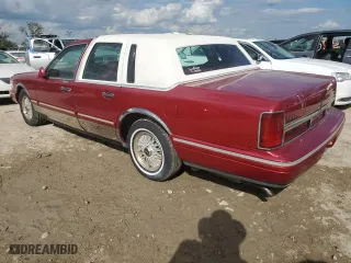 1995 Lincoln Town Car Signature with VIN 1LNLM82W2SY713693, listed as a Copart auction lot 75430484 with 156,859 mi miles and Salvage Title. Bid and sale history available at carsss.com. Image 2.