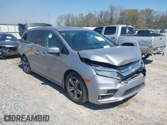 2018 Honda Odyssey Touring with VIN 5FNRL6H84JB070387, listed as a IAAI auction lot 41835852 with 98,662 mi miles. Bid and sale history available at carsss.com. Image 1.