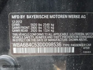 2013 BMW 6 Series 650i xDrive with VIN WBA6B4C53DD098536, listed as a IAAI auction lot 41825107 with 999,999 mi miles. Bid and sale history available at carsss.com. Image 9.