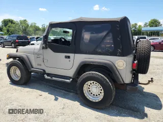 2001 Jeep Wrangler Sport with VIN 1J4FA49S21P374356, listed as a Copart auction lot 63568695 with 202,853 mi miles and Clean title. Bid and sale history available at DreamBid. Image 2.