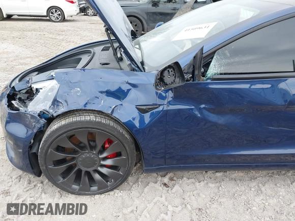 2021 Tesla Model 3 Performance with VIN 5YJ3E1EC6MF996743, listed as a IAAI auction lot 41509631 with 41,599 mi miles and . Bid and sale history available at DreamBid. Image 6.