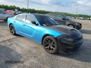 2015 Dodge Charger SXT with VIN 2C3CDXHG1FH848019, listed as a IAAI auction lot 42124399 with 175,247 mi miles and . Bid and sale history available at DreamBid. Image 1.