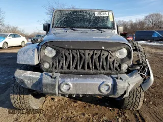 2018 Jeep Wrangler JK Unlimited Sahara with VIN 1C4HJWEGXJL922218, listed as a Copart auction lot 42282815 with 124,637 mi miles and Salvage Title. Bid and sale history available at carsss.com. Image 5.