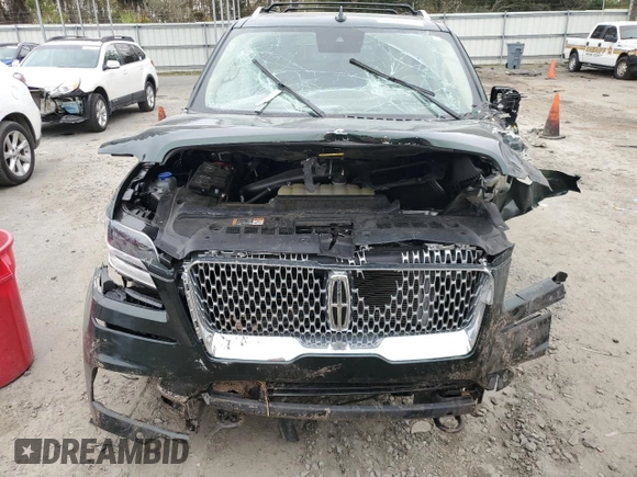 2021 Lincoln Navigator Reserve with VIN 5LMJJ2KT3MEL14652, listed as a Copart auction lot 44128165 with Not provided miles and Salvage title. Bid and sale history available at DreamBid. Image 5.