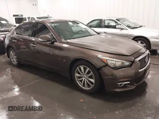 2015 Infiniti Q50 Premium z VIN JN1BV7ARXFM418280, wystawiony jako IAAI lot #42080879 z przebiegiem 126 411 mil mil oraz . Historia ofert i sprzedaży dostępna na DreamBid. Obrazek 1.