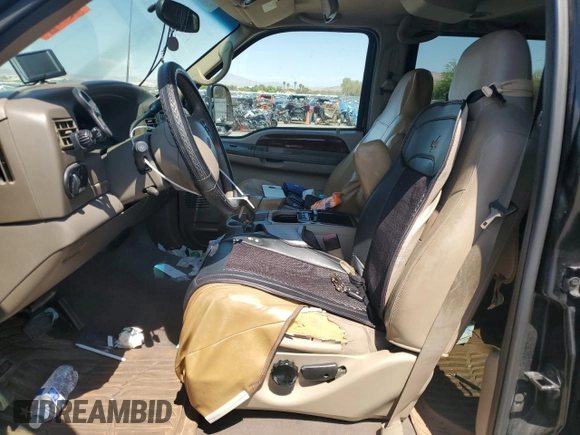 2002 Ford Excursion Limited z VIN 1FMNU43S92EC53835, wystawiony jako Copart lot #60525215 z przebiegiem 207 011 mil mil oraz Szkoda całkowita • Salvage title. Historia ofert i sprzedaży dostępna na DreamBid. Obrazek 7.