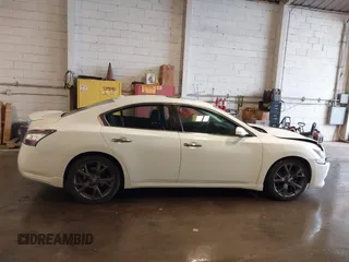 2013 Nissan Maxima SV z VIN 1N4AA5AP6DC804257, wystawiony jako IAAI lot #42264222 z przebiegiem 206 818 mil mil oraz . Historia ofert i sprzedaży dostępna na DreamBid. Obrazek 13.