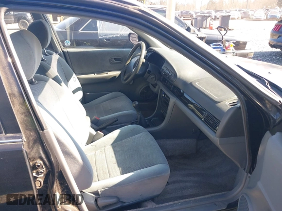 1996 Nissan Altima XE with VIN 1N4BU31D1TC119359, listed as a IAAI auction lot 41664170 with 140,672 mi miles and . Bid and sale history available at DreamBid. Image 5.