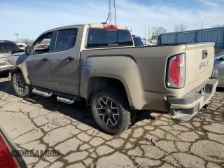 2022 GMC Canyon 4WD AT4 w/Leather with VIN 1GTG6FEN2N1157017, listed as a Copart auction lot 42788605 with 32,317 mi miles and Salvage Title. Bid and sale history available at carsss.com. Image 2.