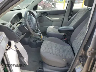 2007 Ford Focus S z VIN 1FAHP34N17W103625, wystawiony jako Copart lot #55300395 z przebiegiem 82 041 mil mil oraz Szkoda całkowita • Salvage title. Historia ofert i sprzedaży dostępna na DreamBid. Obrazek 7.