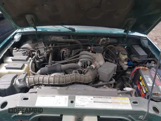 2000 Ford Ranger XL with VIN 1FTYR14V6YTA24267, listed as a IAAI auction lot 41964509 with 140,436 mi miles. Bid and sale history available at carsss.com. Image 10.