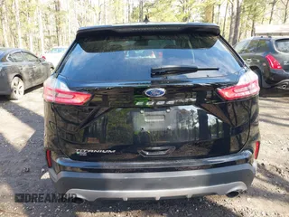 2022 Ford Edge Titanium with VIN 2FMPK4K95NBB06151, listed as a IAAI auction lot 41932545 with 57,762 mi miles and . Bid and sale history available at DreamBid. Image 16.