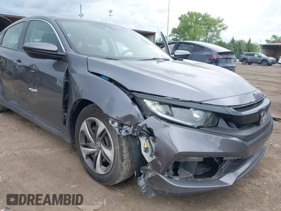 2020 Honda Civic LX z VIN 2HGFC2F62LH547412, wystawiony jako IAAI lot #42254847 z przebiegiem 62 519 mil mil oraz . Historia ofert i sprzedaży dostępna na DreamBid. Obrazek 6.