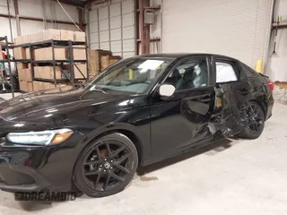 2024 Honda Civic Sport with VIN 2HGFE2F59RH519889, listed as a IAAI auction lot 41598192 with 7,451 mi miles and . Bid and sale history available at DreamBid. Image 6.