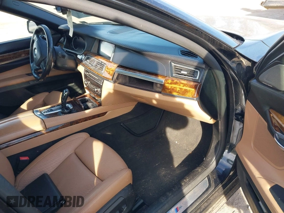 2015 BMW 7 Series 750Li xDrive with VIN WBAYF8C53FD655386, listed as a IAAI auction lot 41474678 with 122,160 mi miles and . Bid and sale history available at carsss.com. Image 5.