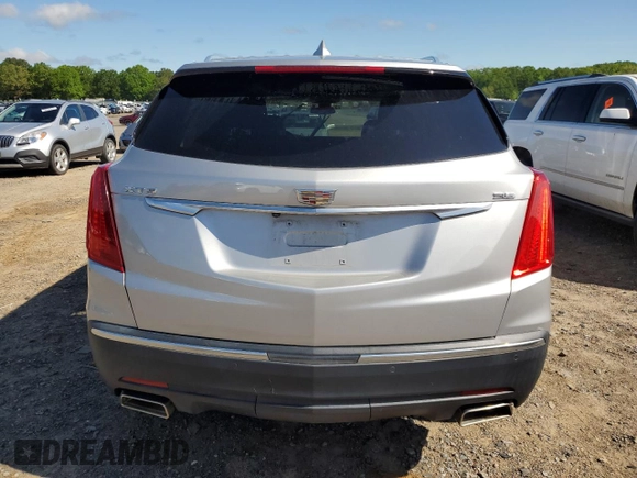 2019 Cadillac XT5 Premium Luxury FWD z VIN 1GYKNERS5KZ235627, wystawiony jako Copart lot #52512755 z przebiegiem Nie podano mil oraz Szkody całkowita. Historia ofert i sprzedaży dostępna na DreamBid. Obrazek 6.
