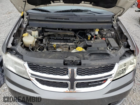 2013 Dodge Journey American Value with VIN 3C4PDCAB7DT500878, listed as a Copart auction lot 58397655 with 183,755 mi miles and Salvage title. Bid and sale history available at DreamBid. Image 12.