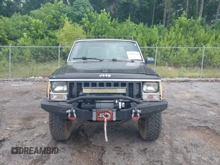 1987 Jeep Cherokee with VIN 1JCMR7819HT174249, listed as a IAAI auction lot 42458110 with 157,683 mi miles and . Bid and sale history available at DreamBid. Image 12.