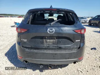 2019 Mazda CX-5 Grand Touring with VIN JM3KFBDM7K0563198, listed as a Copart auction lot 54723494 with 132,126 mi miles and Clean Title. Bid and sale history available at carsss.com. Image 6.