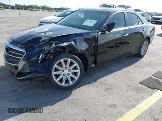 2015 Cadillac CTS RWD with VIN 1G6AP5SX8F0140364, listed as a IAAI auction lot 42535236 with 126,277 mi miles and . Bid and sale history available at DreamBid. Image 6.