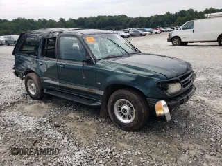 1998 Ford Explorer XLT with VIN 1FMZU32P8WZA91509, listed as a Copart auction lot 65531174 with 127,182 mi miles and Salvage title. Bid and sale history available at DreamBid. Image 4.