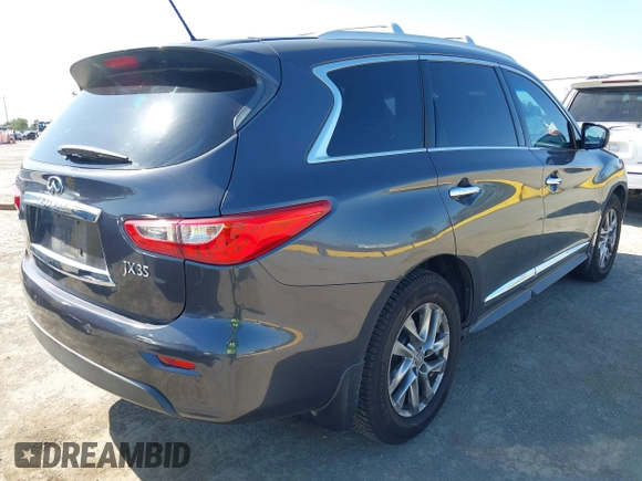2013 Infiniti JX35 with VIN 5N1AL0MM3DC313827, listed as a IAAI auction lot 42185244 with 127,814 mi miles. Bid and sale history available at carsss.com. Image 4.