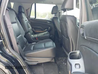 2015 Chevrolet Tahoe LTZ with VIN 1GNSKCKC8FR514671, listed as a IAAI auction lot 42157084 with 182,665 mi miles and . Bid and sale history available at DreamBid. Image 8.
