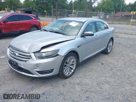 2015 Ford Taurus Limited with VIN 1FAHP2F89FG182598, listed as a IAAI auction lot 42222372 with 124,627 mi miles and . Bid and sale history available at DreamBid. Image 2.