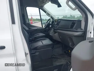2024 Ford Transit Cargo z VIN 1FTBR3X89RKA14329, wystawiony jako IAAI lot #42483348 z przebiegiem 85 692 mil mil oraz . Historia ofert i sprzedaży dostępna na DreamBid. Obrazek 5.