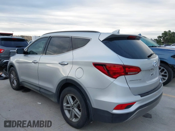 2017 Hyundai Santa Fe 2.4L with VIN 5XYZU3LB4HG464876, listed as a IAAI auction lot 42693100 with 127,888 mi miles and . Bid and sale history available at DreamBid. Image 3.