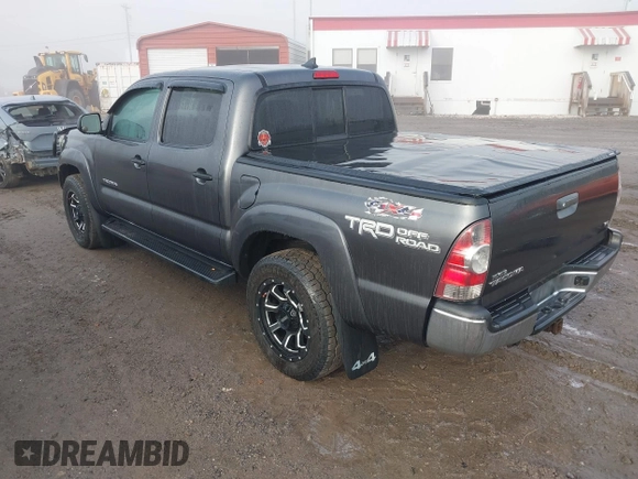 2015 Toyota Tacoma with VIN 3TMLU4EN7FM201302, listed as a IAAI auction lot 41666606 with 200,504 mi miles and . Bid and sale history available at DreamBid. Image 3.