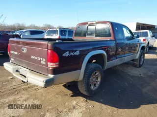 2004 Dodge Dakota SLT with VIN 1D7HG42N34S571352, listed as a IAAI auction lot 41406195 with 206,694 mi miles. Bid and sale history available at carsss.com. Image 4.