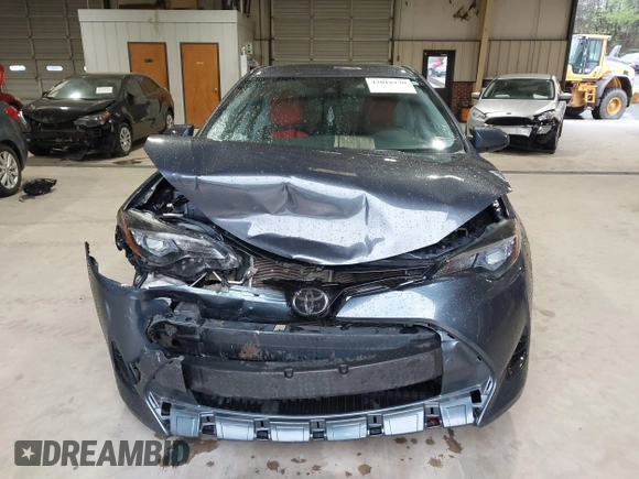 2018 Toyota Corolla L z VIN 5YFBURHE1JP750399, wystawiony jako IAAI lot #42018170 z przebiegiem 83 867 mil mil oraz . Historia ofert i sprzedaży dostępna na DreamBid. Obrazek 13.