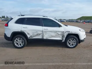 2016 Jeep Cherokee Latitude with VIN 1C4PJMCS1GW185442, listed as a IAAI auction lot 42033699 with 123,306 mi miles. Bid and sale history available at carsss.com. Image 13.