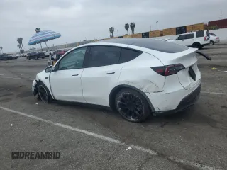 2023 Tesla Model Y Long Range with VIN 7SAYGDEE3PF583883, listed as a Copart auction lot 50920145 with 72,155 mi miles and Salvage Title. Bid and sale history available at DreamBid. Image 2.