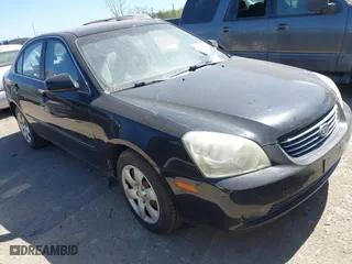 2008 Kia Optima LX with VIN KNAGE123985242231, listed as a IAAI auction lot 41838786 with 217,754 mi miles. Bid and sale history available at carsss.com. Image 1.