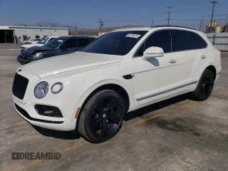 2018 Bentley Bentayga Signature z VIN SJAAC2ZV1JC017896, wystawiony jako Copart lot #64773224 z przebiegiem 19 826 mil mil oraz Szkody całkowita. Historia ofert i sprzedaży dostępna na DreamBid. Obrazek 1.