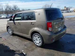 2012 Scion xB with VIN JTLZE4FE8C1144563, listed as a IAAI auction lot 41695722 with 220,706 mi miles and . Bid and sale history available at DreamBid. Image 3.