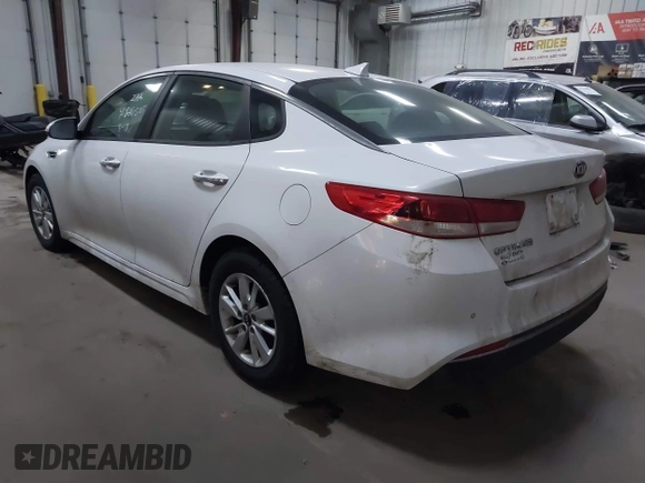 2018 Kia Optima S with VIN 5XXGT4L35JG209737, listed as a IAAI auction lot 41806505 with 98,869 mi miles and . Bid and sale history available at DreamBid. Image 3.