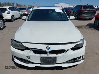 2015 BMW 3 Series 320i with VIN WBA3B1C53FK138341, listed as a IAAI auction lot 41757490 with 125,280 mi miles. Bid and sale history available at carsss.com. Image 12.