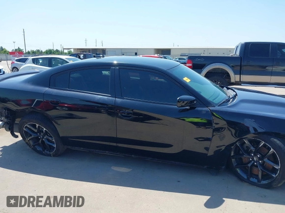 2021 Dodge Charger R/T with VIN 2C3CDXCT4MH684900, listed as a IAAI auction lot 41992358 with 71,386 mi miles and . Bid and sale history available at DreamBid. Image 6.