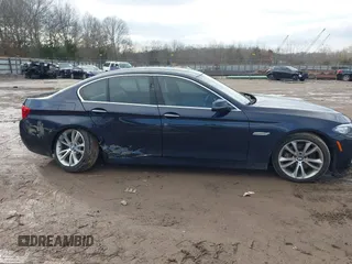 2015 BMW 5 Series 535i with VIN WBA5B1C58FG127959, listed as a IAAI auction lot 41571017 with 122,274 mi miles and . Bid and sale history available at carsss.com. Image 13.