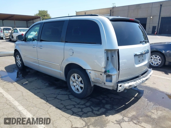 2010 Chrysler Town & Country Touring with VIN 2A4RR5D11AR346489, listed as a IAAI auction lot 42102358 with 150,860 mi miles. Bid and sale history available at carsss.com. Image 3.
