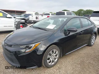 2023 Toyota Corolla LE with VIN 5YFB4MDE0PP067417, listed as a IAAI auction lot 42144017 with 51,652 mi miles. Bid and sale history available at carsss.com. Image 2.