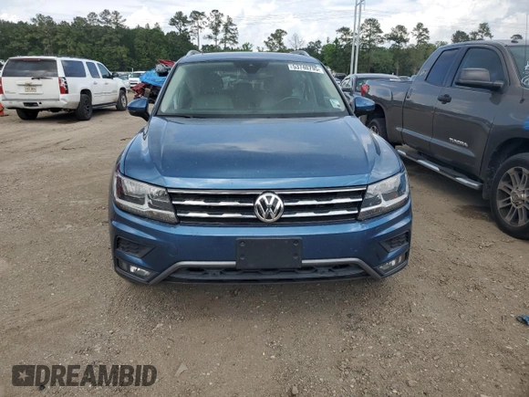2020 Volkswagen Tiguan SE z VIN 3VV3B7AXXLM124257, wystawiony jako Copart lot #53740795 z przebiegiem 63 455 mil mil oraz Szkoda całkowita • Salvage title. Historia ofert i sprzedaży dostępna na DreamBid. Obrazek 5.