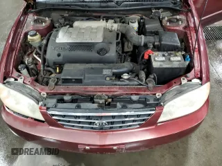 2003 Kia Spectra with VIN KNAFB121735217341, listed as a Copart auction lot 72016504 with 116,224 mi miles and Salvage Title. Bid and sale history available at DreamBid. Image 11.