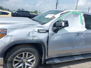 2020 GMC Sierra 1500 SLT z VIN 3GTU9DED9LG299417, wystawiony jako IAAI lot #42168562 z przebiegiem Nie podano mil oraz . Historia ofert i sprzedaży dostępna na DreamBid. Obrazek 6.