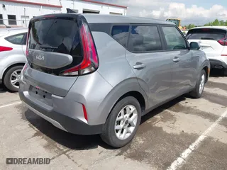 2024 Kia Soul LX with VIN KNDJ23AU1R7917180, listed as a IAAI auction lot 42010309 with 7,915 mi miles. Bid and sale history available at carsss.com. Image 4.